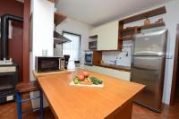 Kuchyň nebo kuchyňský kout v ubytování Apartment Gasparini