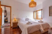 Posteľ alebo postele v izbe v ubytovaní ARACHOVA MOUNTAIN VIEW