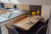 Kuchyňa alebo kuchynka v ubytovaní Aberle Apartments
