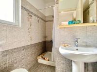 A bathroom at SeaFront Villa Ourania