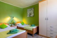 Postel nebo postele na pokoji v ubytování Rooms Edna