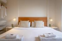 Posteľ alebo postele v izbe v ubytovaní Vibe Apartments by Olala Homes