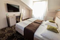 Łóżko lub łóżka w pokoju w obiekcie Parkhotel Plzen Congress Center