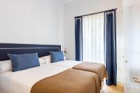 Postel nebo postele na pokoji v ubytování LS9- La Palmera Luxury by Valcambre