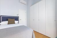 Postel nebo postele na pokoji v ubytování LS9- La Palmera Luxury by Valcambre