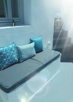 Posezení v ubytování Golden Stone Santorini Suites