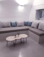 Posezení v ubytování Golden Stone Santorini Suites