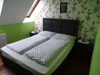 Posteľ alebo postele v izbe v ubytovaní Alíz Vendégház