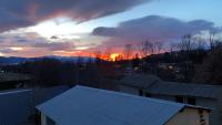 a view of a sunset from the roof of a house at Chez Hélène 3 étoiles, labellisé disabled PMR,pour 4 personnes chiens bienvenus-pet friendly in Bourg-Madame