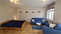 Posedenie v ubytovaní Apartament Parkowy Piątka