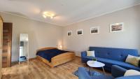 Posedenie v ubytovaní Apartament Parkowy Piątka