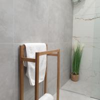 Kúpeľňa v ubytovaní Q Apart AMBER - klimatyzowane STUDIO przy Manufakturze z garażem Gratis, FV