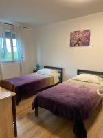 Posteľ alebo postele v izbe v ubytovaní Studio apartman Bel-Ben