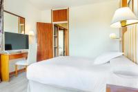 Postel nebo postele na pokoji v ubytování Hotel Vejo