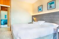 Postel nebo postele na pokoji v ubytování Hotel Vejo