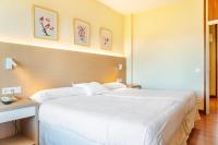 Postel nebo postele na pokoji v ubytování Hotel Vejo