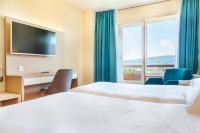 Postel nebo postele na pokoji v ubytování Hotel Vejo
