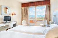 Postel nebo postele na pokoji v ubytování Hotel Vejo