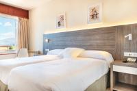 Postel nebo postele na pokoji v ubytování Hotel Vejo