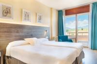 Postel nebo postele na pokoji v ubytování Hotel Vejo