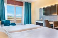 Postel nebo postele na pokoji v ubytování Hotel Vejo
