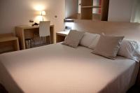 Postel nebo postele na pokoji v ubytování Hotel Europa