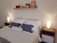 Posteľ alebo postele v izbe v ubytovaní Apartman marino