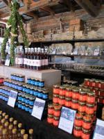 a store filled with lots of jars of food at Tertin Kartano in Mikkeli