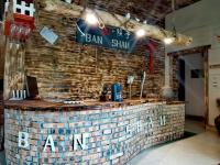 Et logo, certifikat, skilt eller en pris der bliver vist frem på Banshan Yard