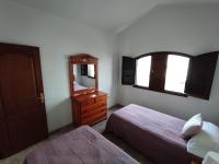 Łóżko lub łóżka w pokoju w obiekcie Mirador del Risco
