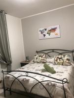 Łóżko lub łóżka w pokoju w obiekcie La Casa al Bacio