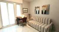 A seating area at COMODO AL MARE