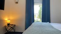 Postel nebo postele na pokoji v ubytování MADONCA ROOMS & RESTAURANT