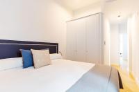 Postel nebo postele na pokoji v ubytování LS9- La Palmera Luxury by Valcambre