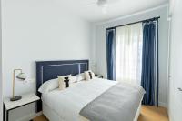 Postel nebo postele na pokoji v ubytování LS9- La Palmera Luxury by Valcambre