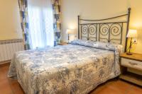 Postel nebo postele na pokoji v ubytování Casa El Puente