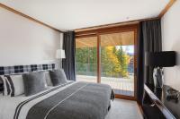 Postel nebo postele na pokoji v ubytování Sport Club Residences & Spa