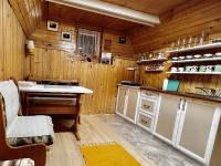 A kitchen or kitchenette at Chatka vo Vysokých Tatrách