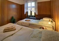 Posteľ alebo postele v izbe v ubytovaní Apartament z panorama Szrenicy - duzy 70m2, 2 sypialnie i salon, idealny dla duzej grupy!