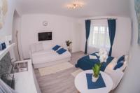 Posteľ alebo postele v izbe v ubytovaní Rába Apartman House