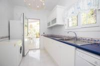 A kitchen or kitchenette at Menorca Villa Marbella