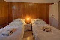 Posteľ alebo postele v izbe v ubytovaní Apartament z panorama Szrenicy - duzy 70m2, 2 sypialnie i salon, idealny dla duzej grupy!