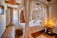 Łóżko lub łóżka w pokoju w obiekcie Dimora storica Giorni resort & spa