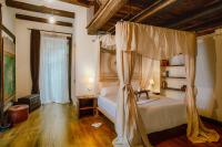 Łóżko lub łóżka w pokoju w obiekcie Dimora storica Giorni resort & spa