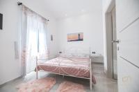 Postel nebo postele na pokoji v ubytování Luxury Villa Ivy