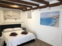 Posteľ alebo postele v izbe v ubytovaní Apartment City Gem