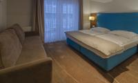 Posteľ alebo postele v izbe v ubytovaní Holiday Home Aparthotel z balkonem przy plaży