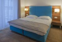 Posteľ alebo postele v izbe v ubytovaní Holiday Home Aparthotel z balkonem przy plaży