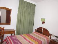 Posteľ alebo postele v izbe v ubytovaní Hotel Elena María