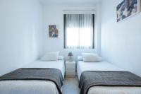 Posteľ alebo postele v izbe v ubytovaní Apartamento Mairena